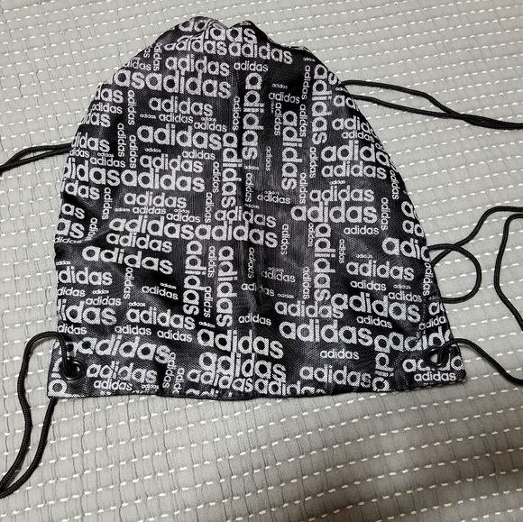 Adidas, reversible draw cord backpack. - Picture 1 of 2
